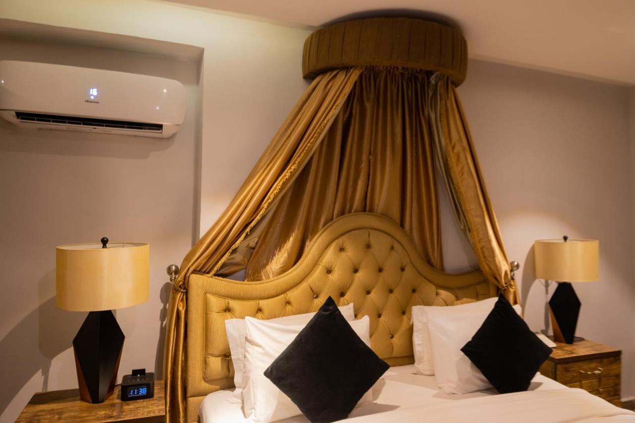 Villa Monument Hotel Aliayabiagba Extérieur photo