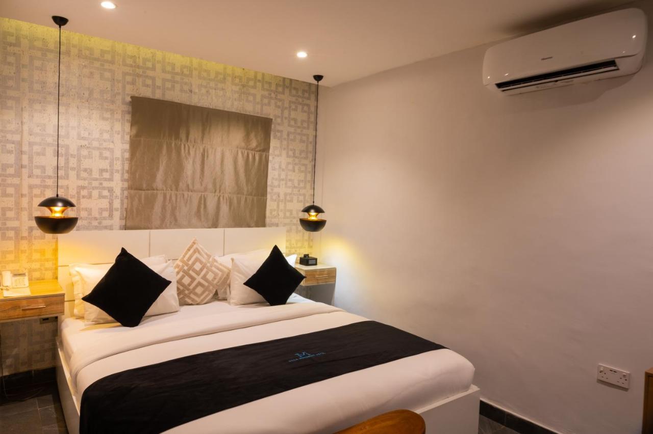 Villa Monument Hotel Aliayabiagba Extérieur photo