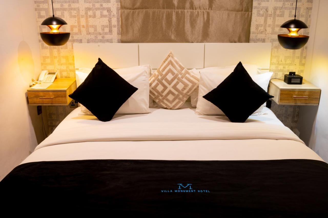 Villa Monument Hotel Aliayabiagba Extérieur photo