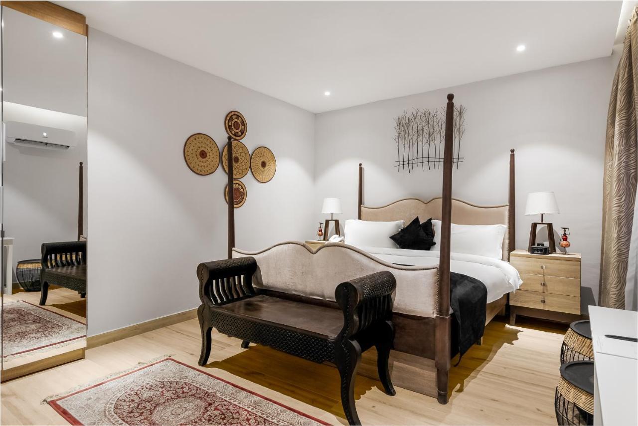 Villa Monument Hotel Aliayabiagba Extérieur photo