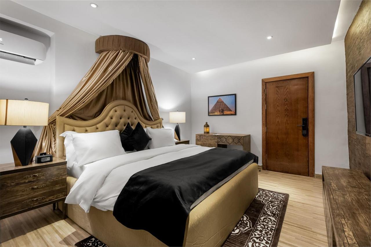 Villa Monument Hotel Aliayabiagba Extérieur photo