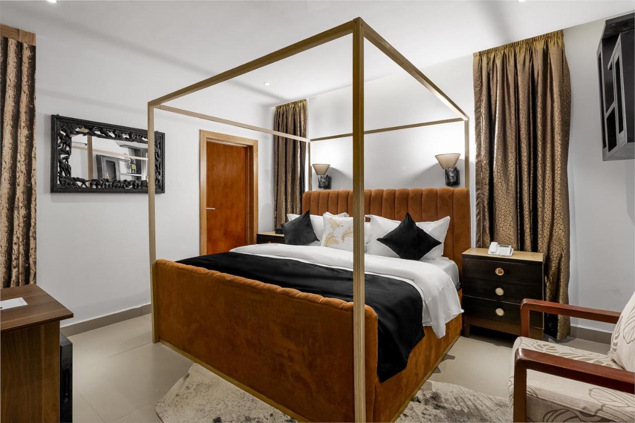 Villa Monument Hotel Aliayabiagba Extérieur photo